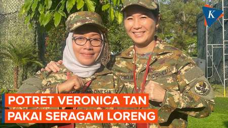 Potret Veronica Tan Pakai Seragam Loreng Sambil Salam Komando