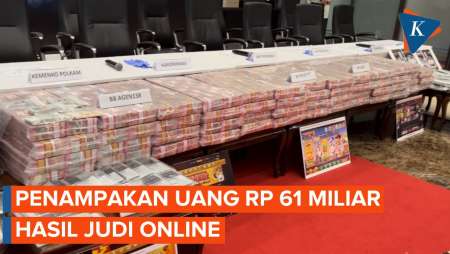 Polisi Pamerkan Uang Rp 61 Miliar Hasil Sitaan Judi Online