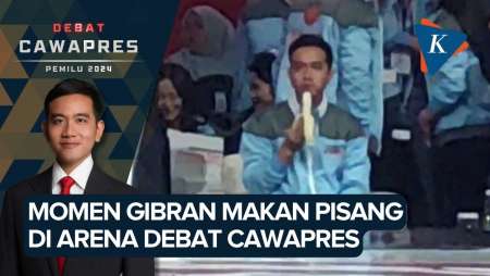 Gibran Ngemil Pisang Saat Jeda Iklan Debat Keempat Pilpres 2024