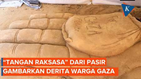 Tangan Raksasa dari Pasir Ini Gambarkan Derita Kelaparan Warga Gaza